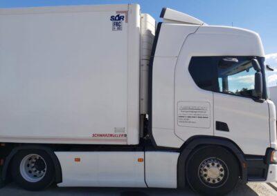 interaxle curtain in a truck