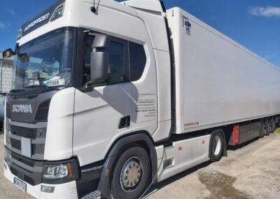 white truck interaxle curtain